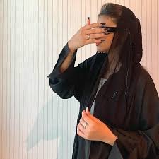 Aisha K., Manama